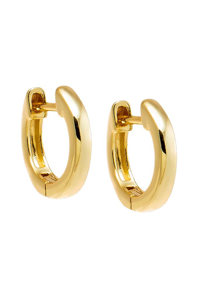 Gold hoop earrings on a white background