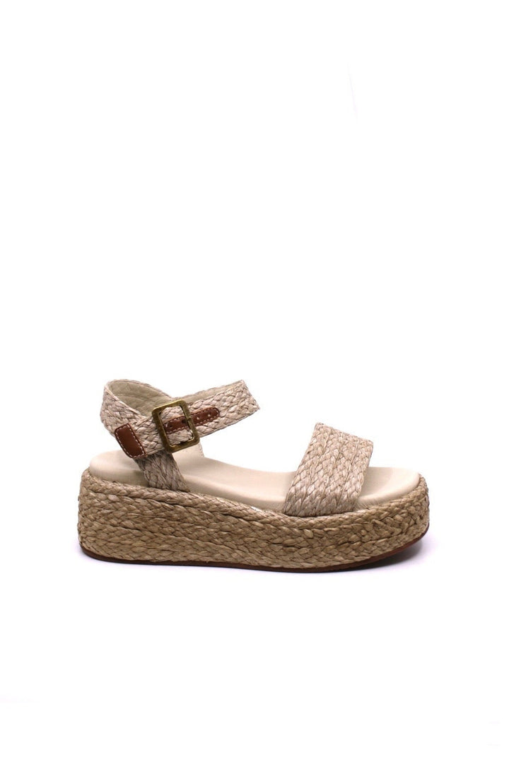 raffia and a woven ankle strap platform sandals, with leather lining and a padded footbed for ultimate comfort. features  a 2" heel and 1 1/2" platform in ivory color from chocolat blu