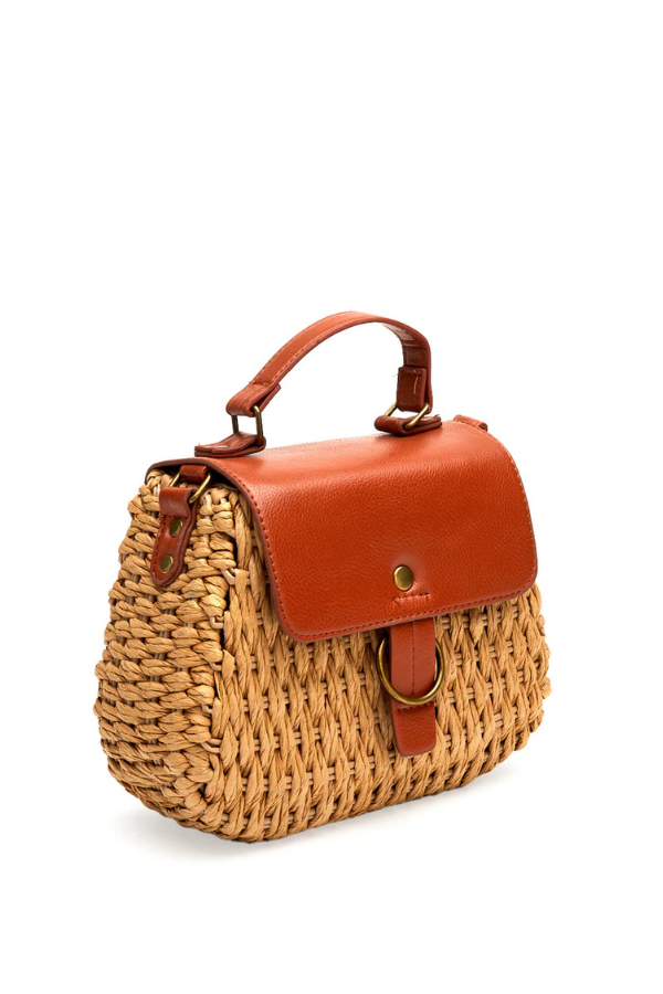 Matisse Harbor Tan Raffia front view - Dear Lucy
Small raffia bag with a leather top handle, detachable shoulder strap, and cover flap.