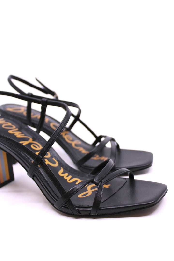 Sam Edelman Emmie Black side view- Dear Lucy The Emmie boasts a stylish strappy construction and stable block heel, seamlessly fusing contemporary charm with ease.