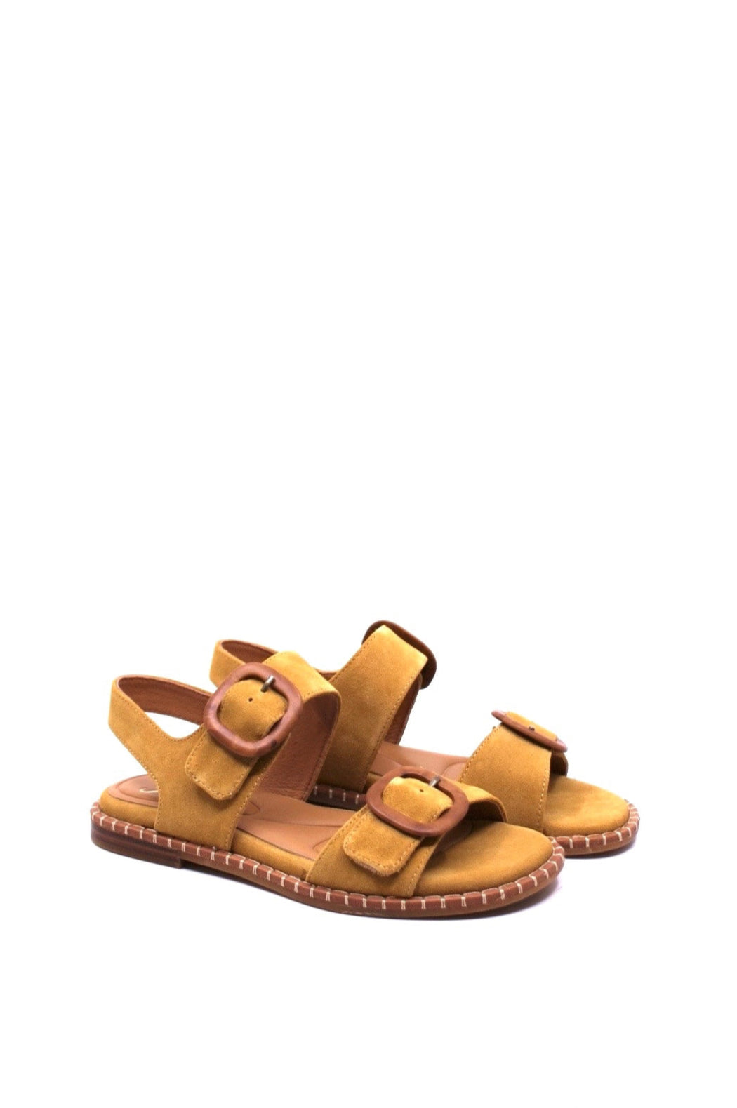 his sandal features an easy slip-on design, soft lining, and a cushioned footbed for all-day comfort