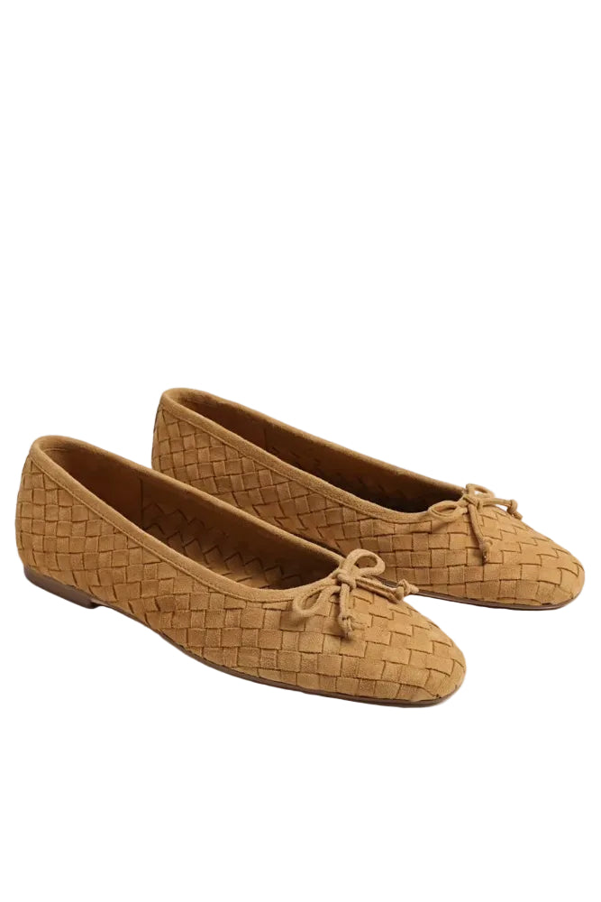 A pair of tan woven leather ballet flats with small bow details on the toes, displayed on a clean white background.