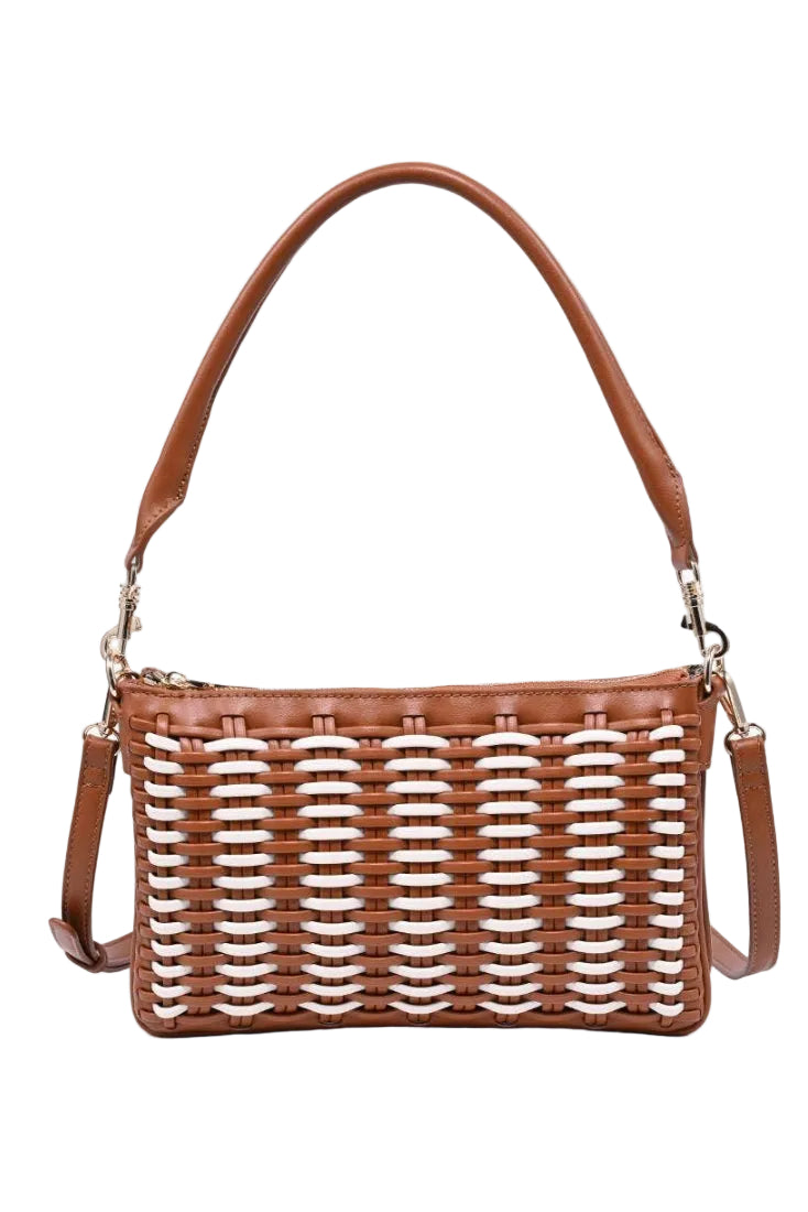 Brown woven handbag with leather accents on a white background