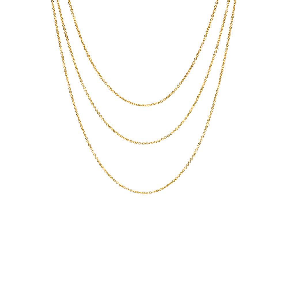 Three gold chains stacked on a white background