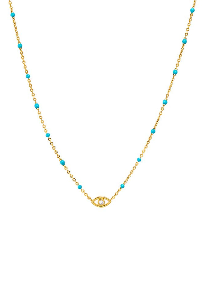 Gold necklace with turquoise beads on a white background