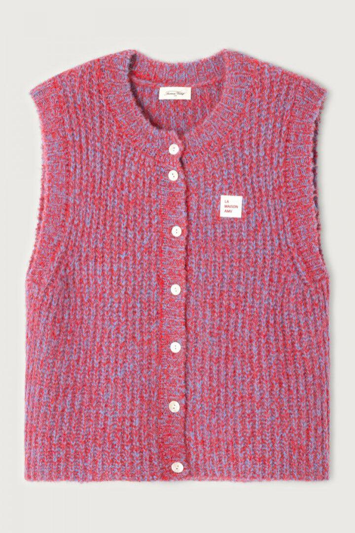 Red and blue patterned sleeveless button-up shirt on a light gray background