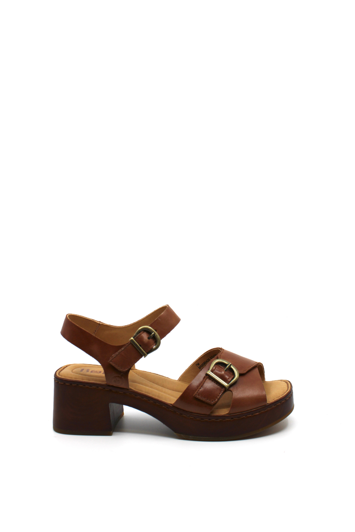 Brown sandal with wooden sole and gold buckle closures 