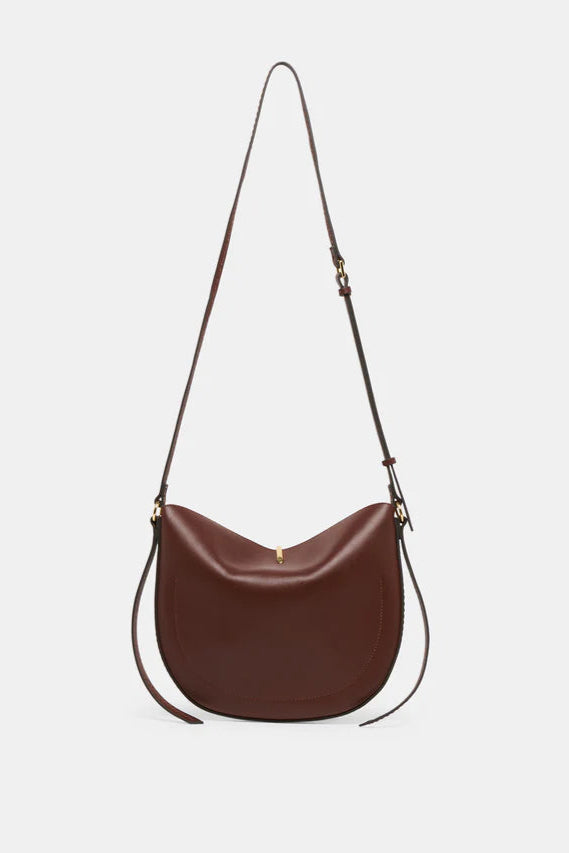 Brown leather handbag with a strap 