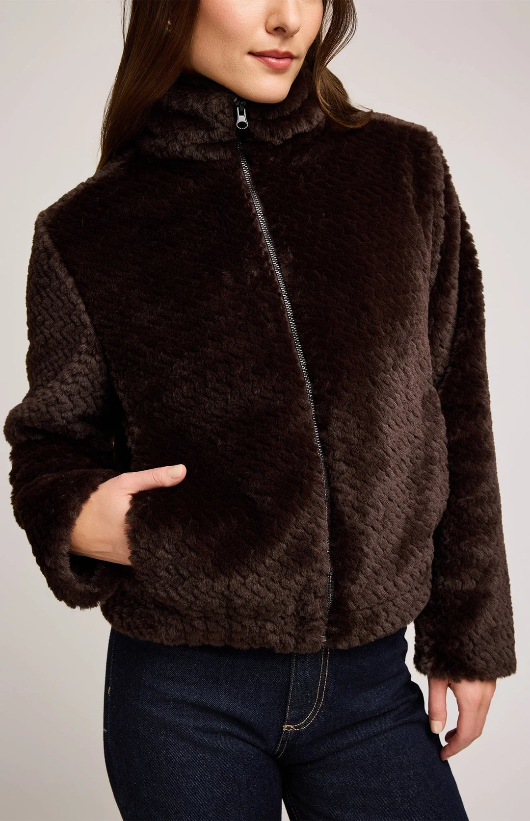 brown fur jacket rafted from soft faux fur with a subtle herringbone finish, this jacket is fully lined for comfort and designed to keep you warm on cooler days.