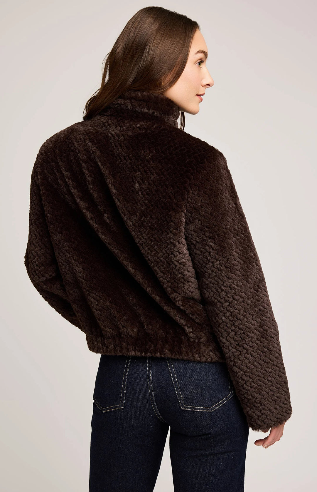 brown fur jacket rafted from soft faux fur with a subtle herringbone finish, this jacket is fully lined for comfort and designed to keep you warm on cooler days.