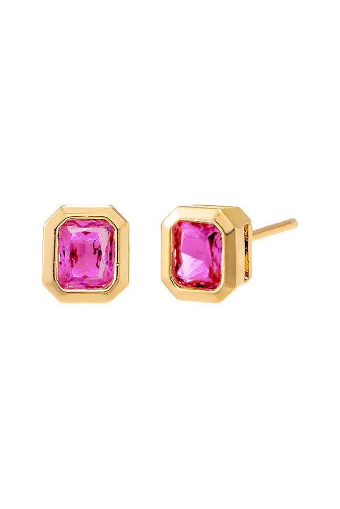 Gold earrings with pink gemstones on a white background