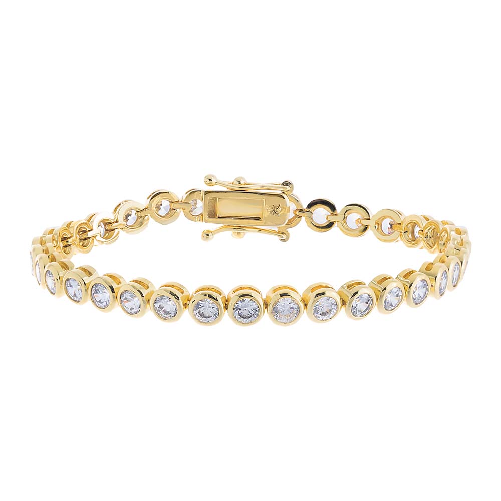 Gold bracelet with clear stones on a white background