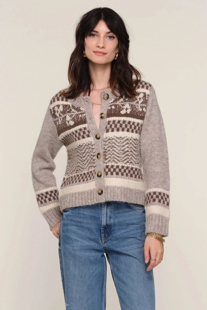 Long sleeve button up cardigan with brown and cream colored design 