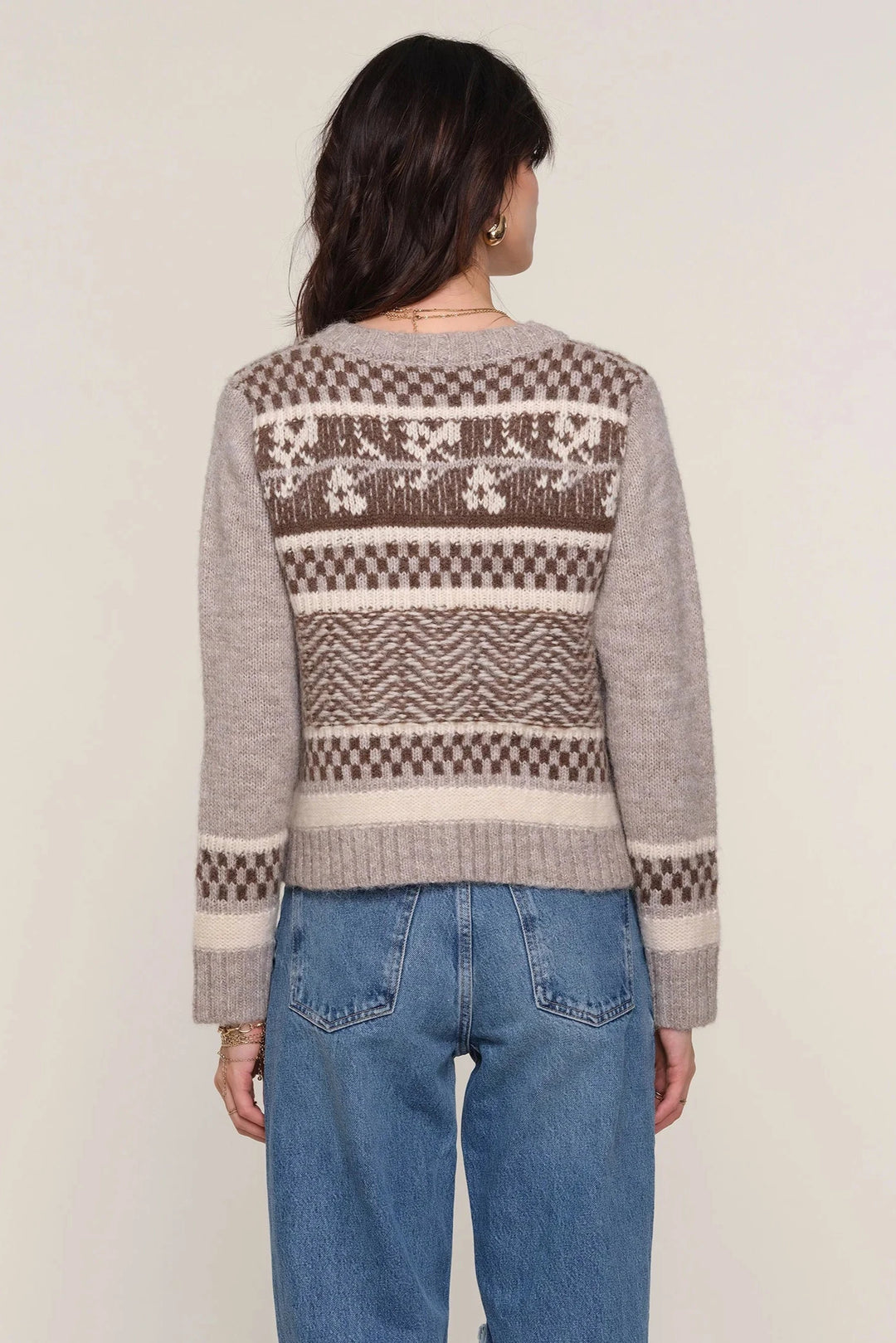 Long sleeve button up cardigan with brown and cream colored design 
