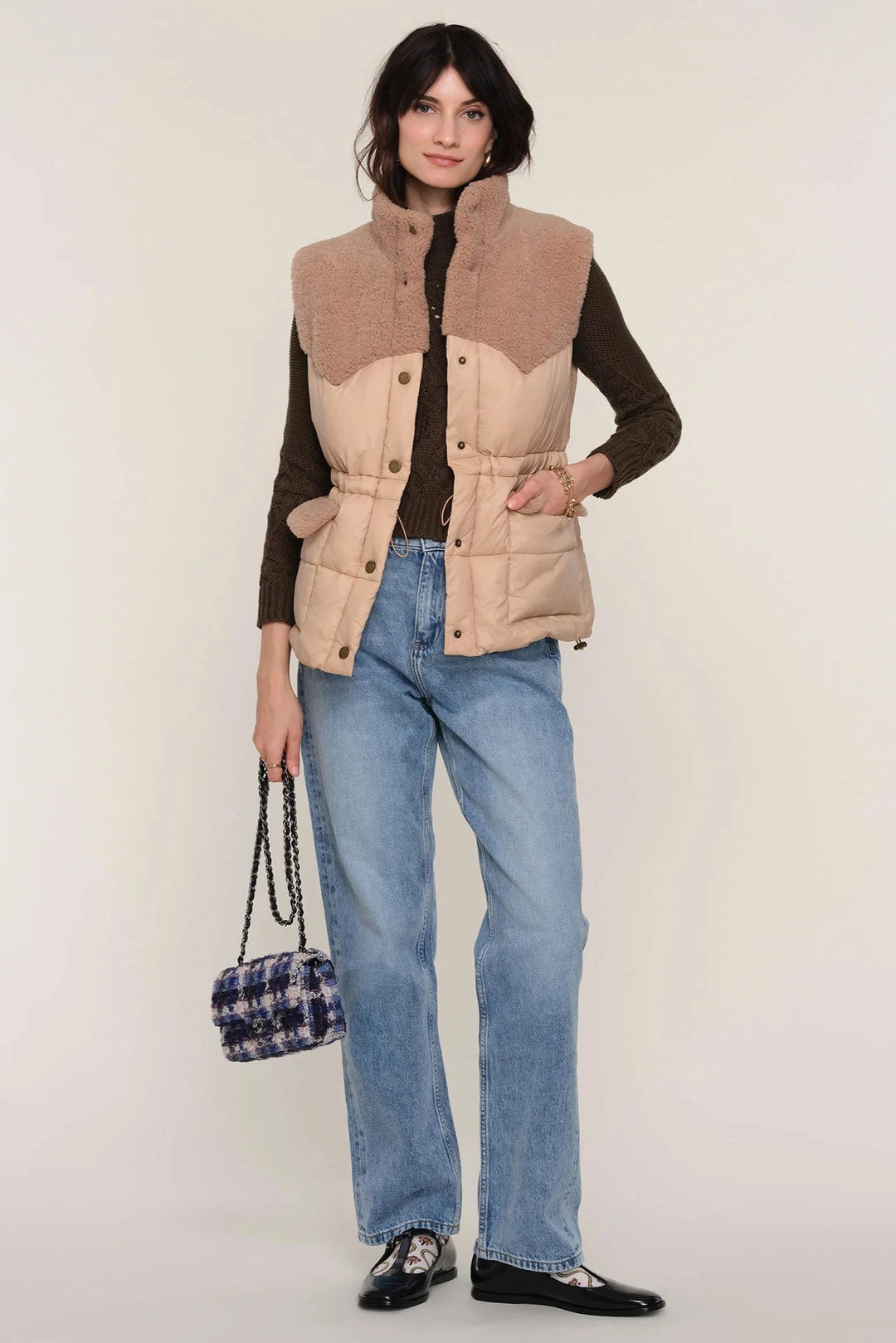 Button up vest in cream, top half sherpa bottom half quilted puffer fabric