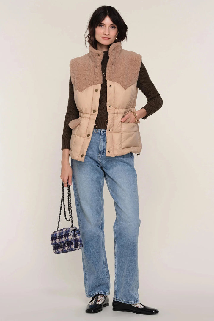 Button up vest in cream, top half sherpa bottom half quilted puffer fabric
