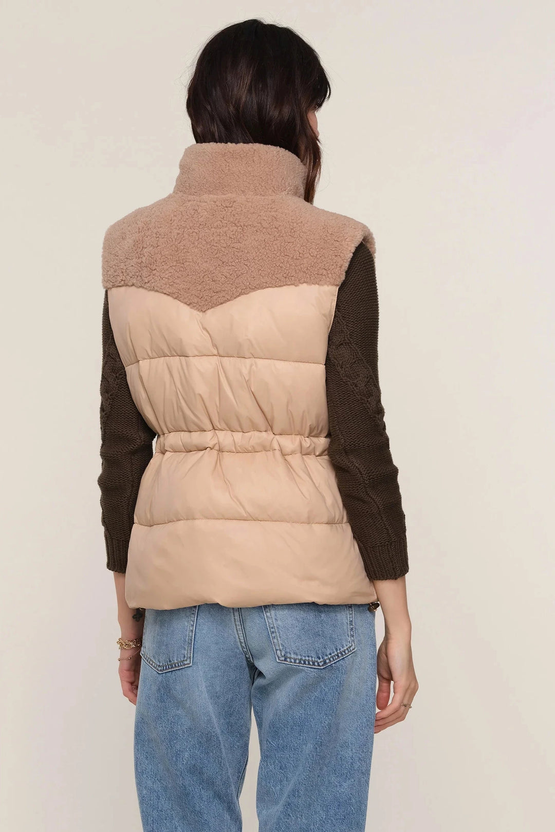 Button up vest in cream, top half sherpa bottom half quilted puffer fabric