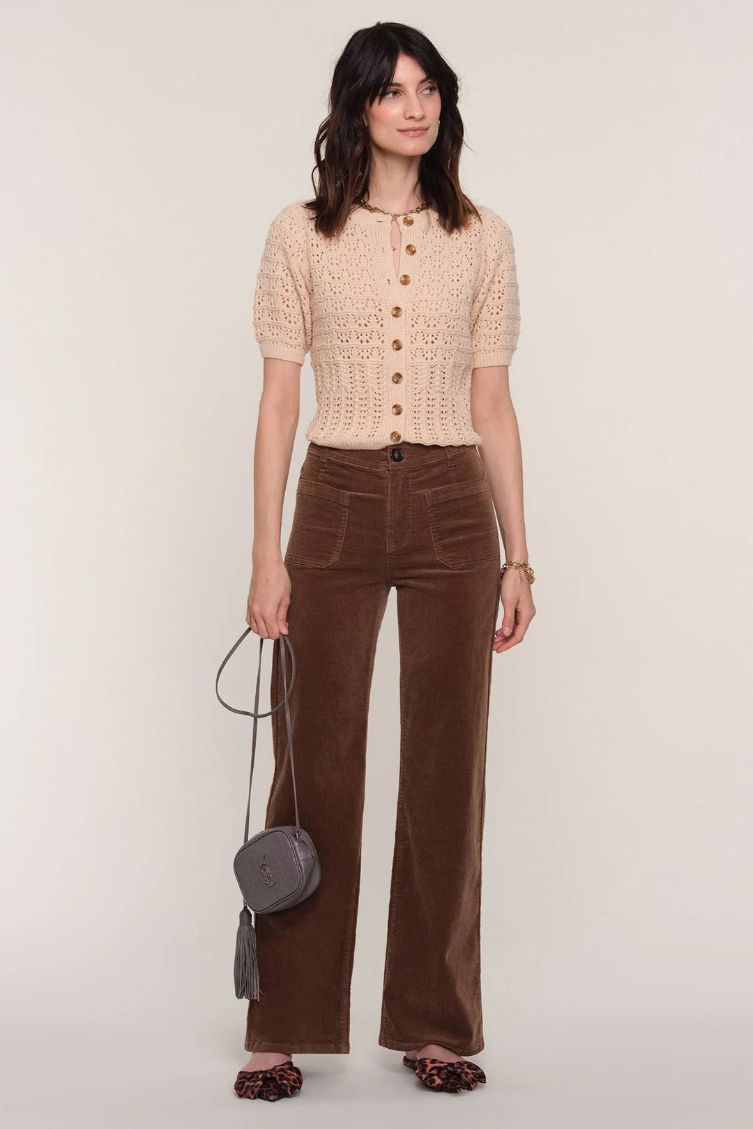 Brown corduroy straight leg pant with functioning front pocket