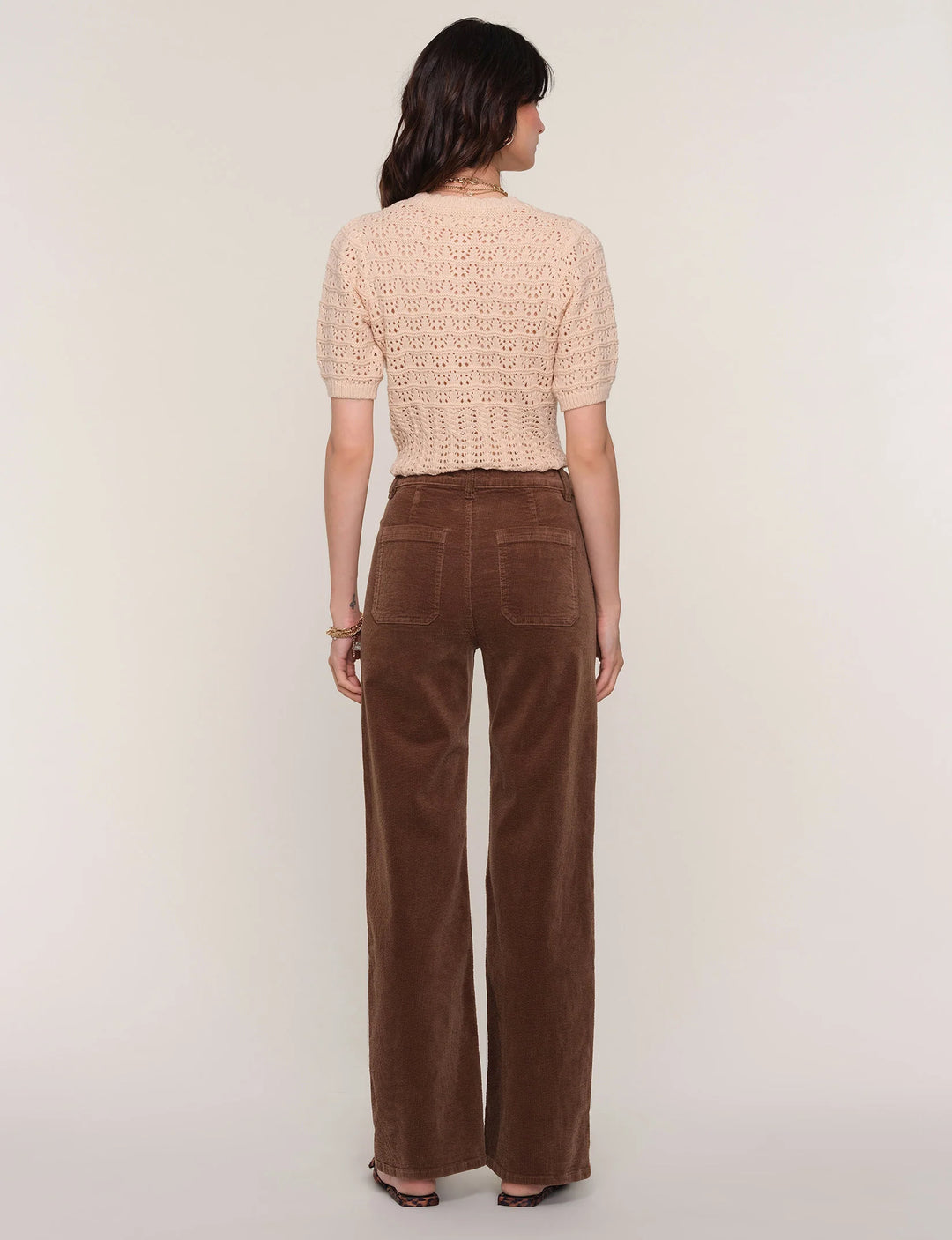 Brown corduroy straight leg pant with functioning front pocket