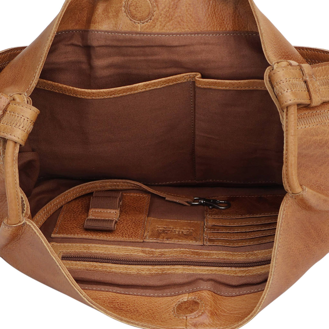 12”H x 7”D x 13”L 1” wide strap with 11” drop Exterior zip pocket with signature hidden cell phone pocket and hidden snap closure Interior organization A built-in dog leash clip ensures your keys stay secure.