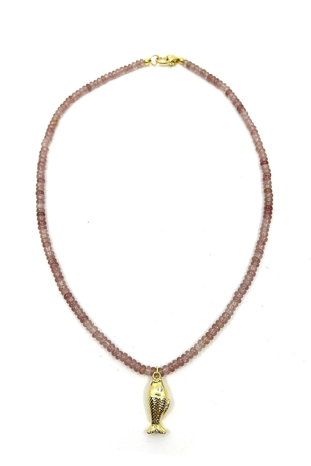 Necklace with a gold fish pendant on a white background