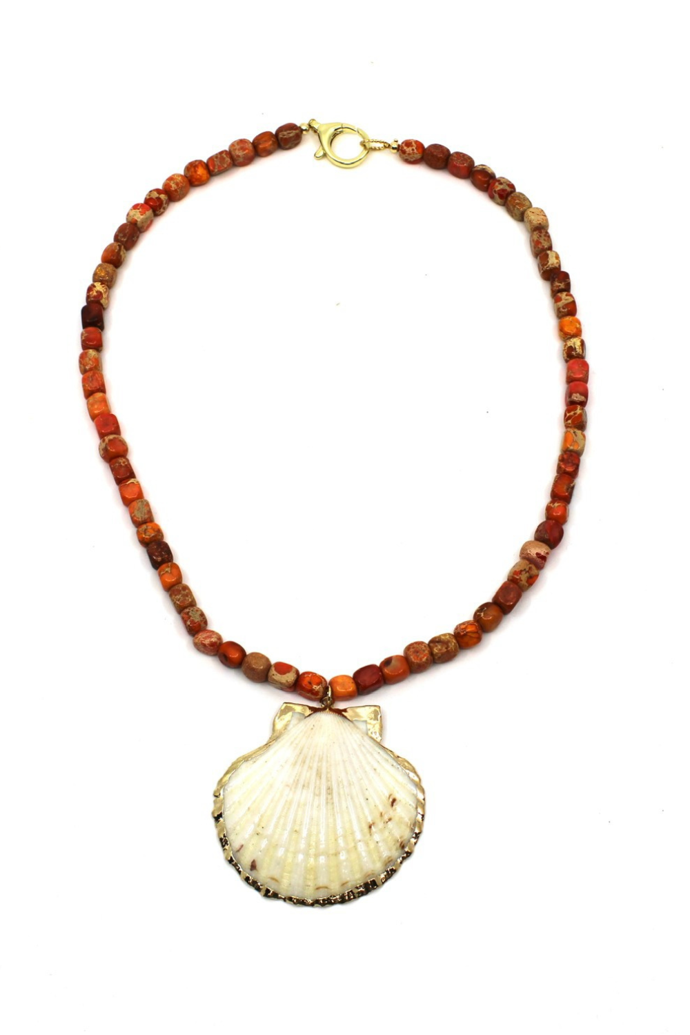 Necklace with red beads and a shell pendant on a white background