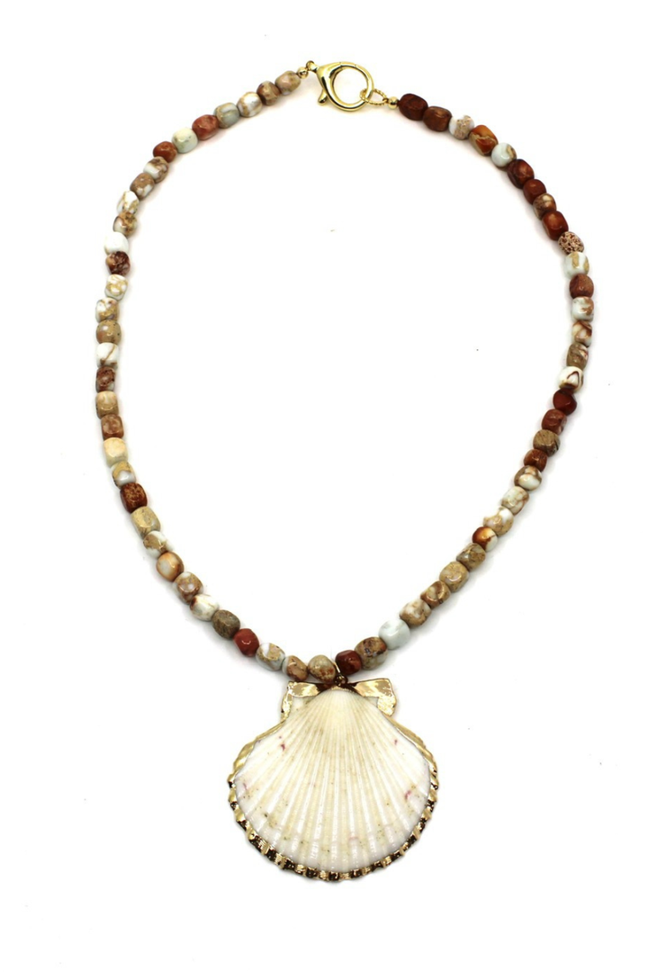 Necklace with shell pendant and multicolored beads on a white background