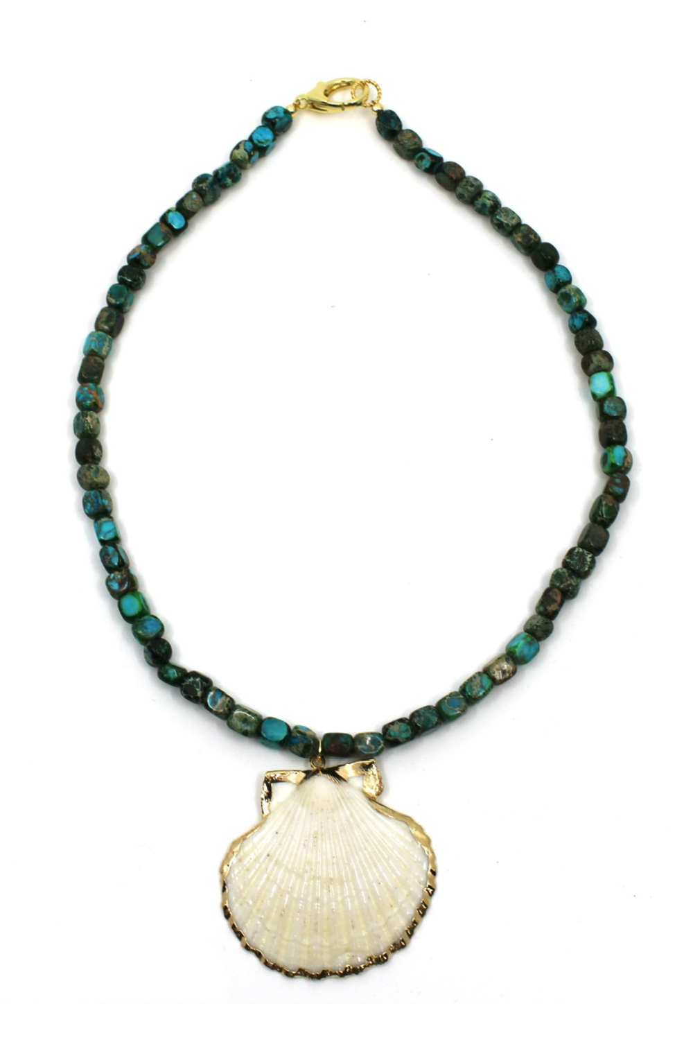 Necklace with green beads and a shell pendant on a white background