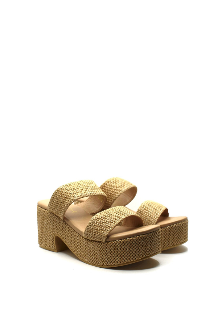 Beige platform sandals on a white background