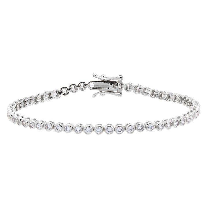 Silver bracelet with clear stones on a white background