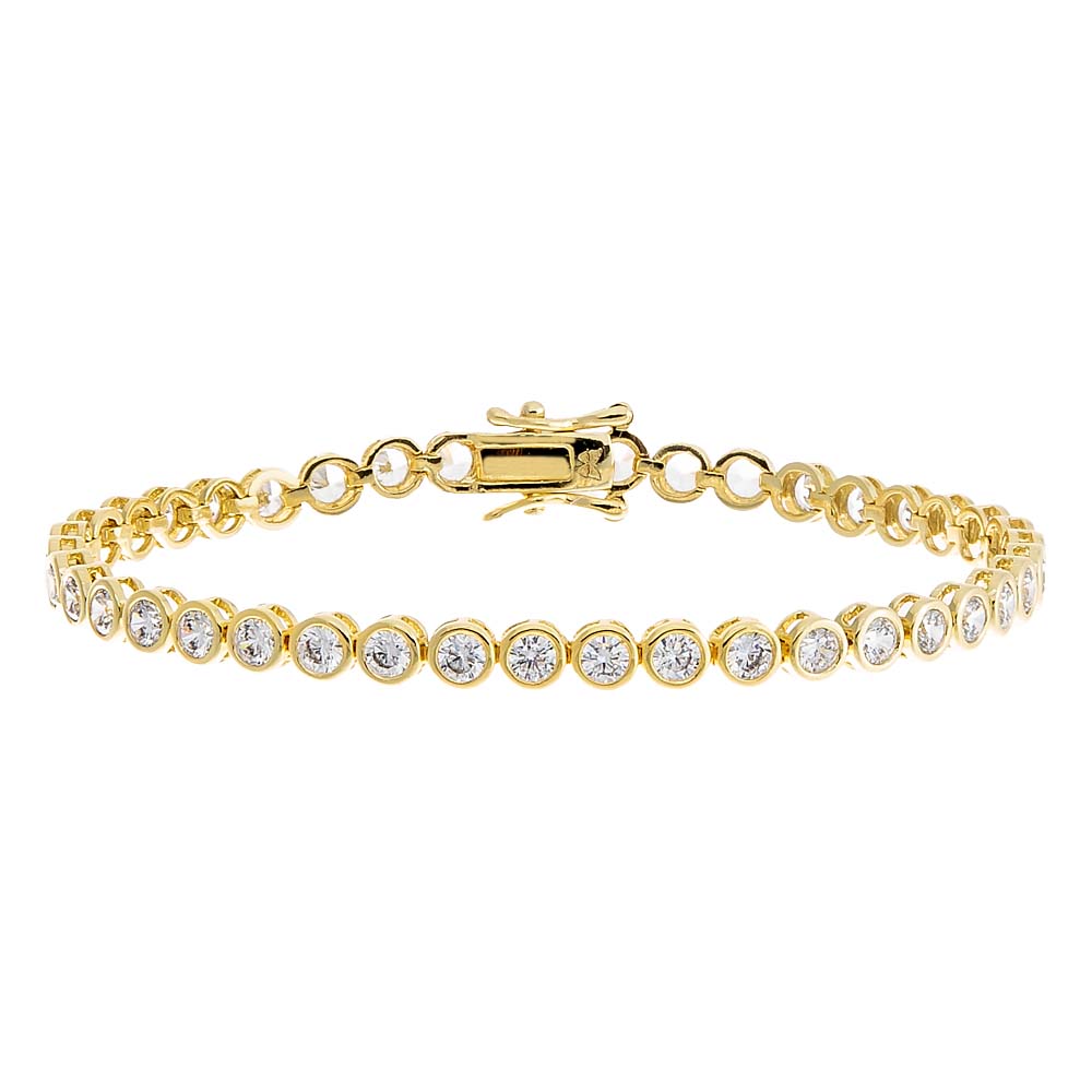 Gold bracelet with clear stones on a white background