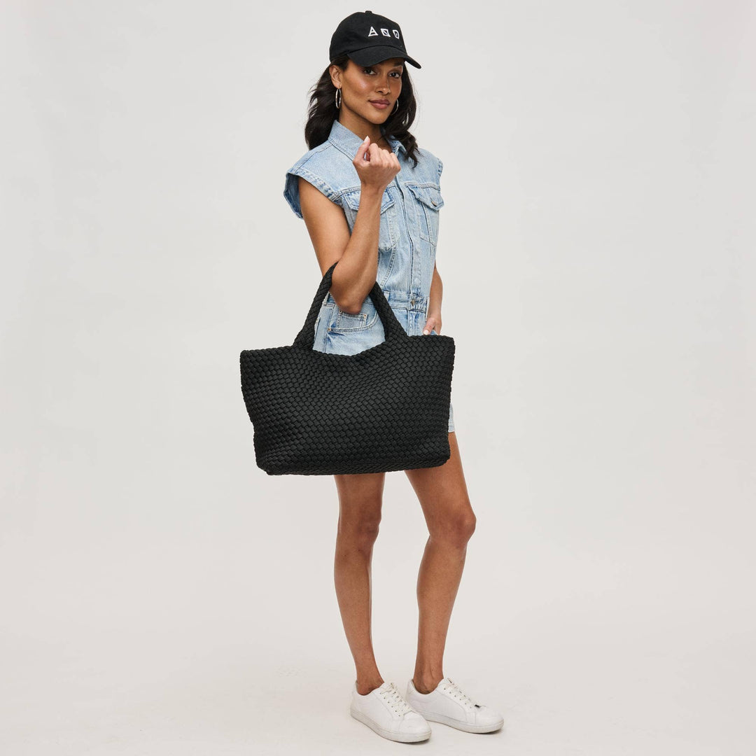 Sol and Selene Sky's The Limit - Large Woven Sustainable Tote: Black - Dear Lucy *Item Type: Tote
*Material: Polyester
*Closure: Snap
*Exterior Details: Woven, Handle Drop 7"
*Interior Details: Open Compartment, Removeable Zipper Pouch