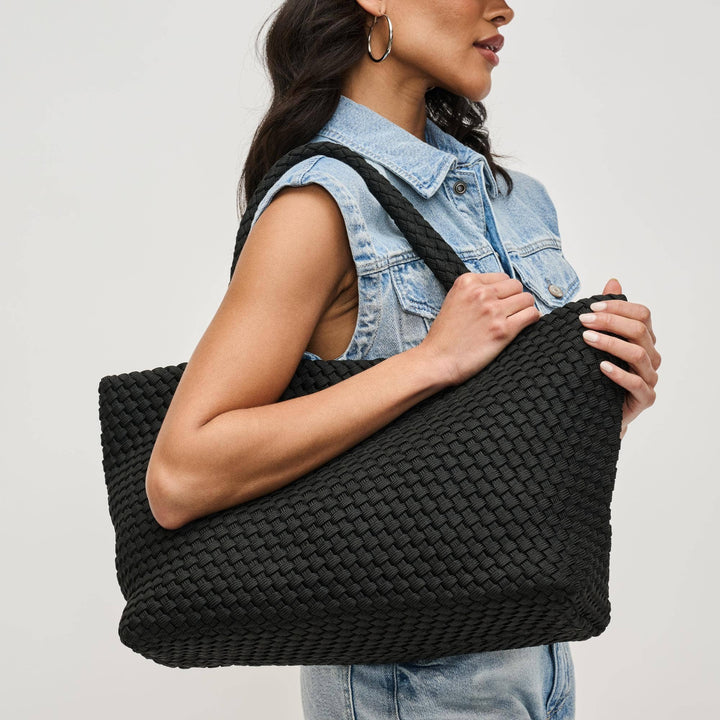 Sol and Selene Sky's The Limit - Large Woven Sustainable Tote: Black - Dear Lucy *Item Type: Tote
*Material: Polyester
*Closure: Snap
*Exterior Details: Woven, Handle Drop 7"
*Interior Details: Open Compartment, Removeable Zipper Pouch