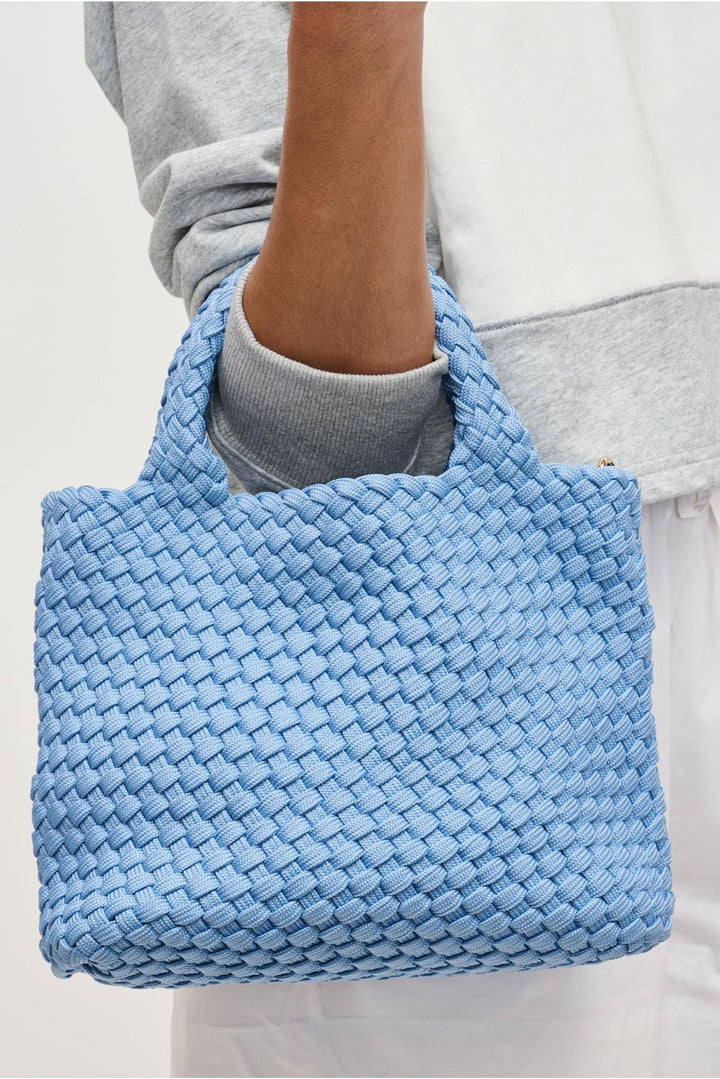 Sol and Selene Sky's The Limit - Small Sustainable Crossbody: Azure - Dear Lucy *Item Type: Crossbody
*Material: Polyester
*Closure: Snap
*Exterior Details: Woven, Adjustable/ detachable shoulder strap 18"-29"
*Interior Details: Open Compartment, Removeable Zipper Pouch
*Handle Drop: 5"