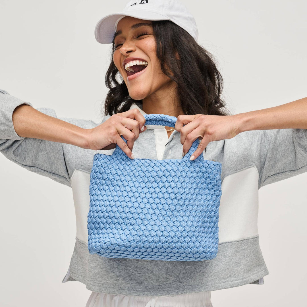 Sol and Selene Sky's The Limit - Small Sustainable Crossbody: Azure - Dear Lucy *Item Type: Crossbody
*Material: Polyester
*Closure: Snap
*Exterior Details: Woven, Adjustable/ detachable shoulder strap 18"-29"
*Interior Details: Open Compartment, Removeable Zipper Pouch
*Handle Drop: 5"