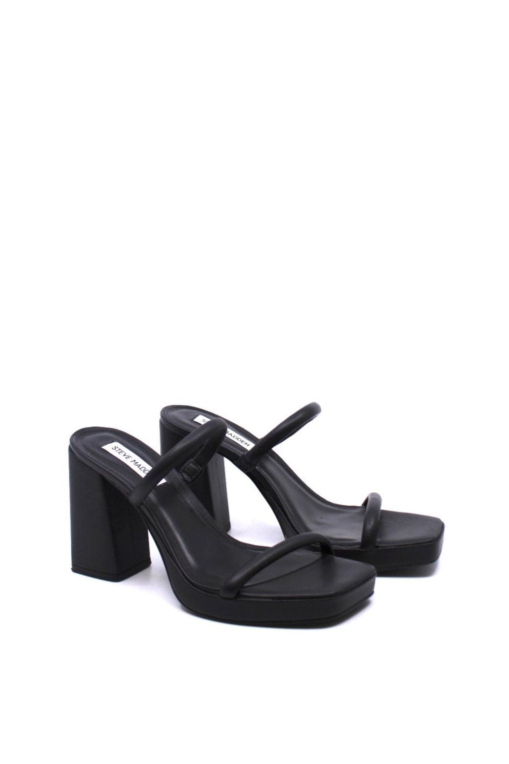 Steve Madden Polly Black side view- Dear Lucy Platform heel slide sandal
Slip-on style with stretch panel on front strap
Square toe
Block heel
4 inch heel height
.75 inch platform
Vegan leather upper material
Vegan leather lining
Synthetic sole
