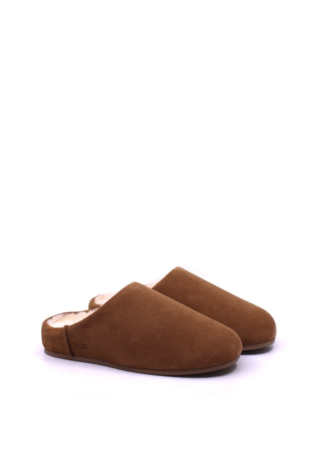 Pair of brown slippers mules by UGG