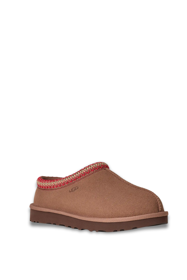 Brown UGG slipper with red trim and sherpa lining 