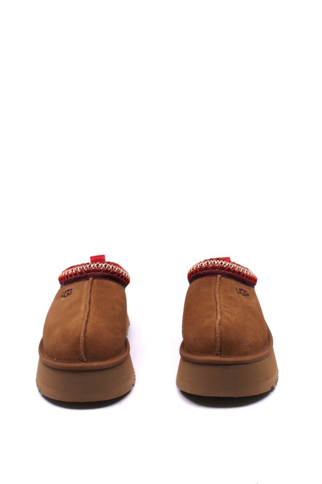 Brown slippers with red trim and platform sole from UGG  