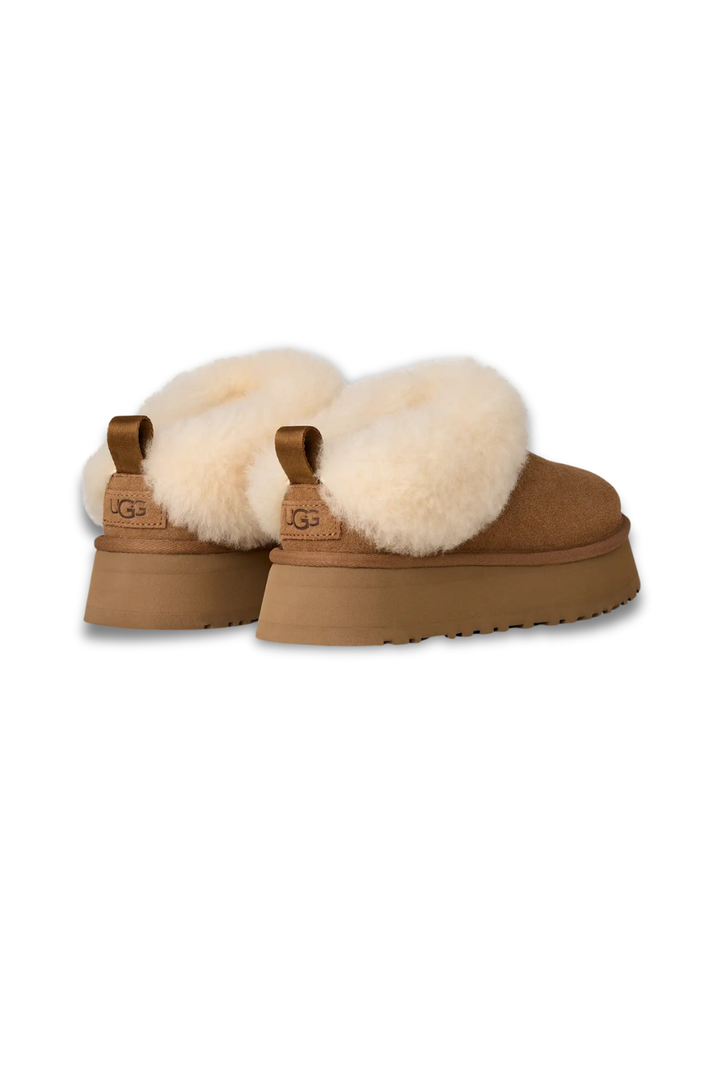 Pair of UGG boots with fluffy white fur trim
