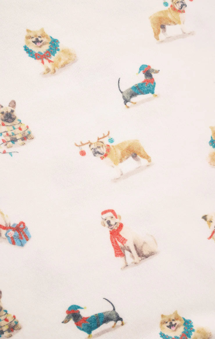 Pattern of dogs wearing Christmas-themed accessories on a white pajamas Z Supply