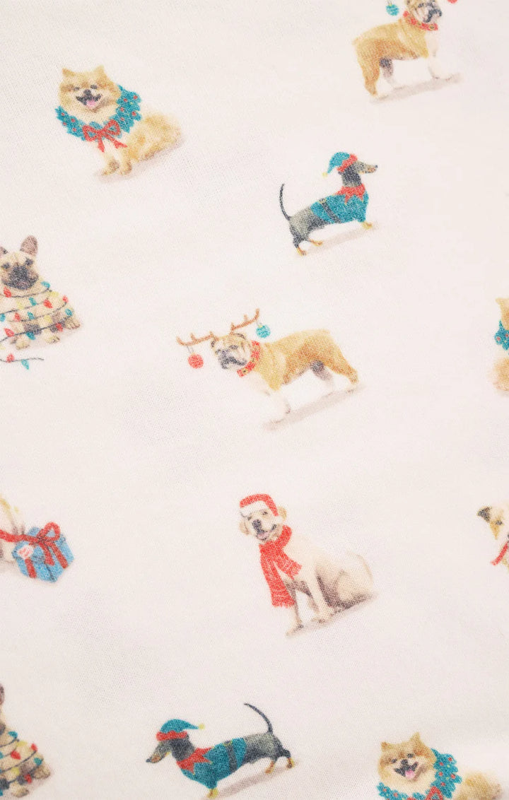 Pattern of dogs wearing Christmas-themed accessories on a white pajamas Z Supply