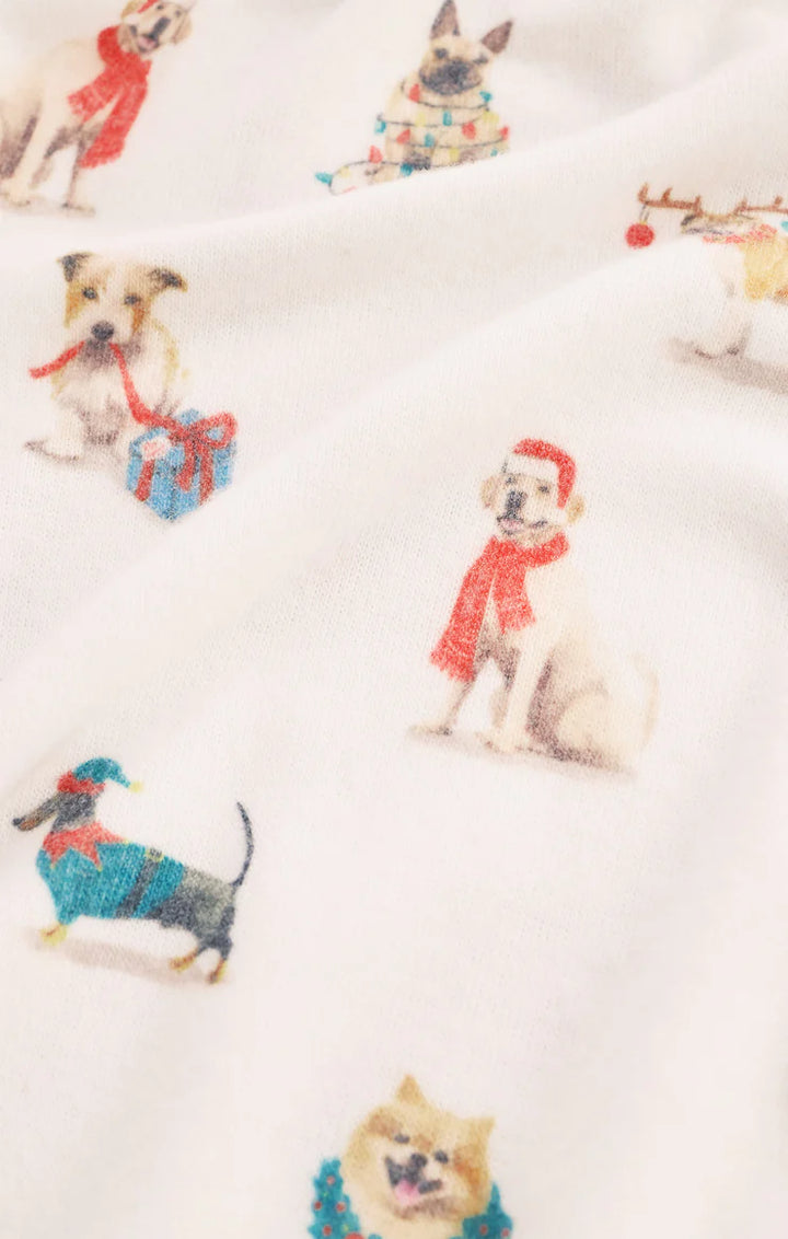 Pattern of dogs in winter clothing on white Z Supply pajamas