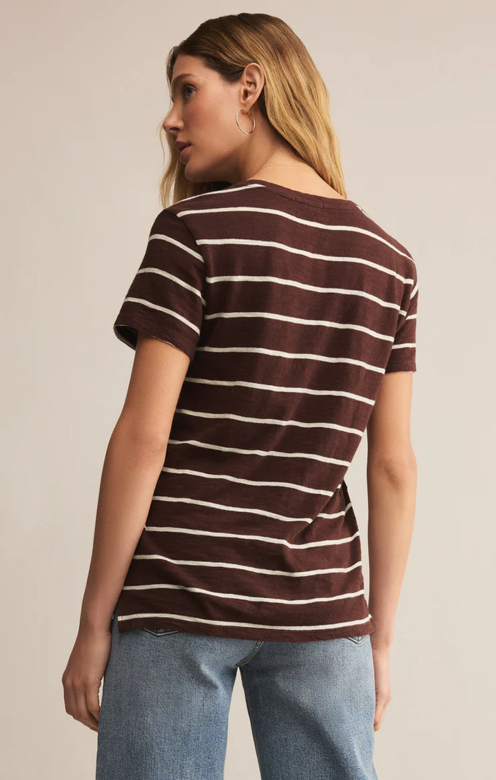 Woman wearing a brown and white striped t-shirt with crew neck 