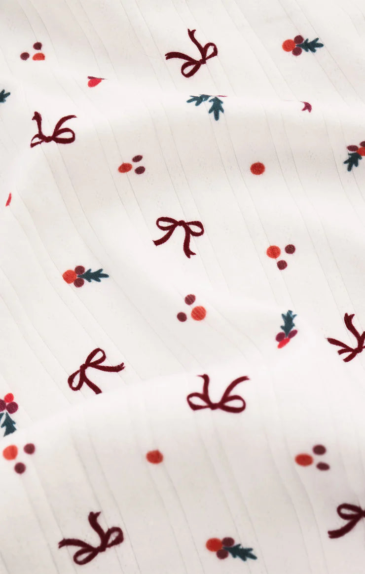 White pajama fabric with red bows and berries pattern Z Supply
