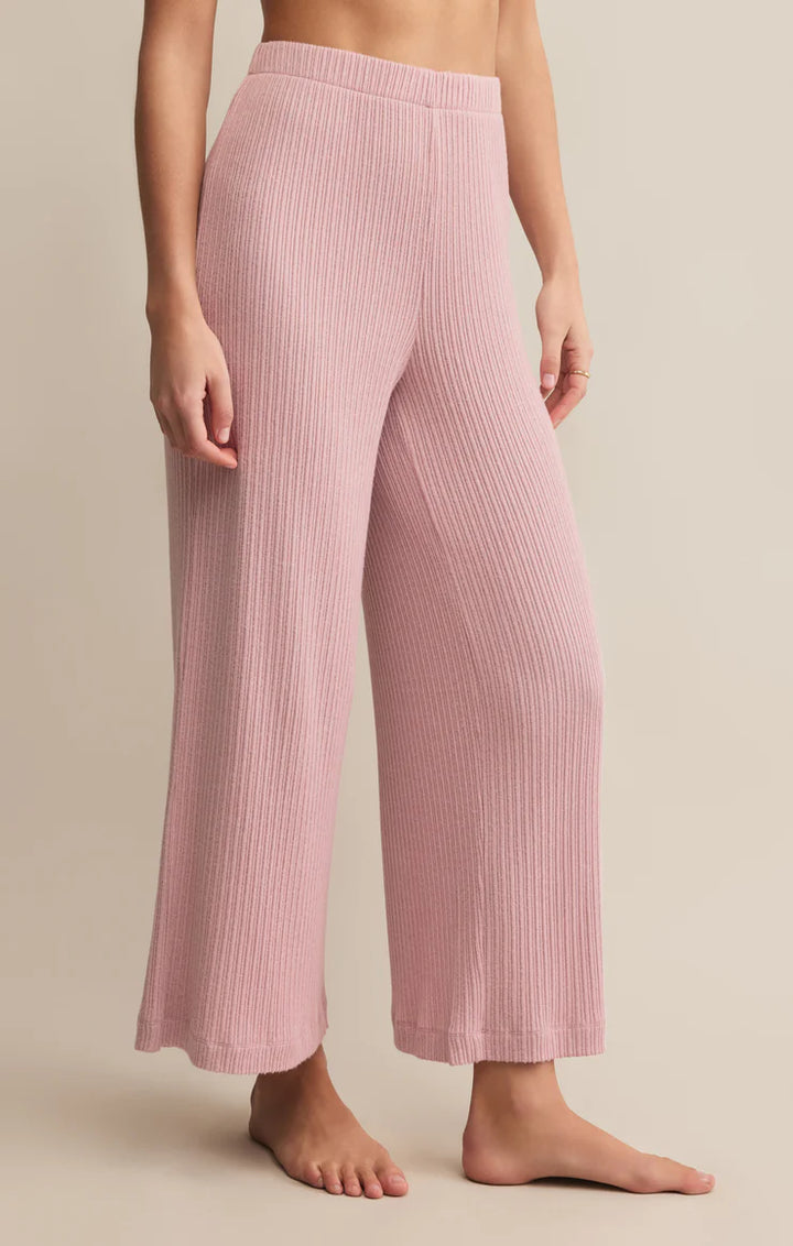 The Coastline Mini Rib Pant by Z Supply is your new favorite for off-duty comfort and effortless fall style. Crafted from ultra-soft mini rib knit, this high-rise pant features a wide-leg silhouette, elastic waistband with drawstring, and an easygoing fit that moves with you.