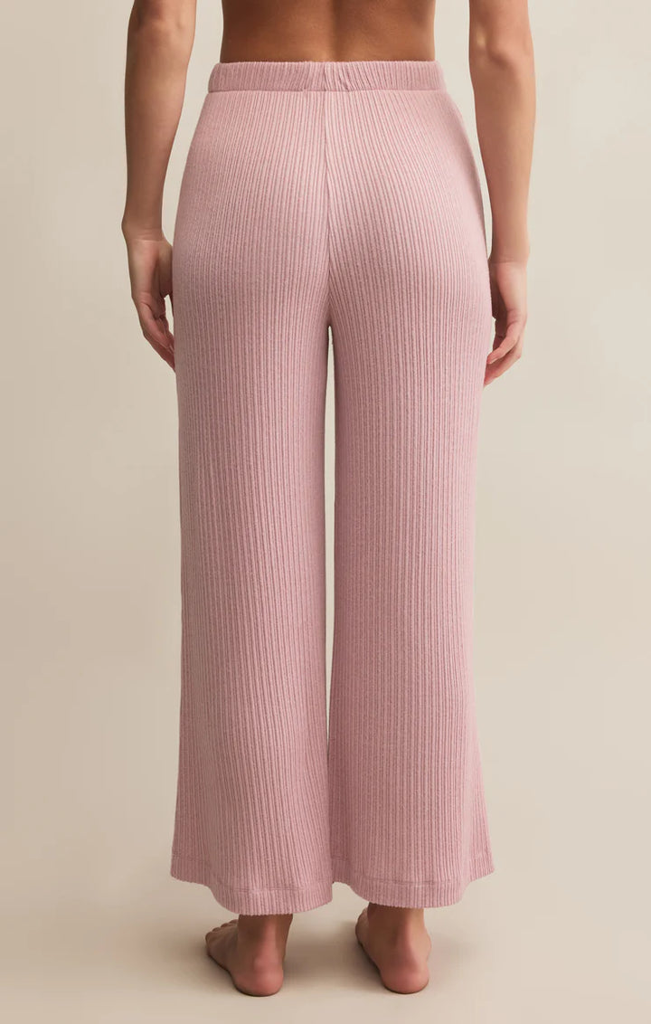 The Coastline Mini Rib Pant by Z Supply is your new favorite for off-duty comfort and effortless fall style. Crafted from ultra-soft mini rib knit, this high-rise pant features a wide-leg silhouette, elastic waistband with drawstring, and an easygoing fit that moves with you.