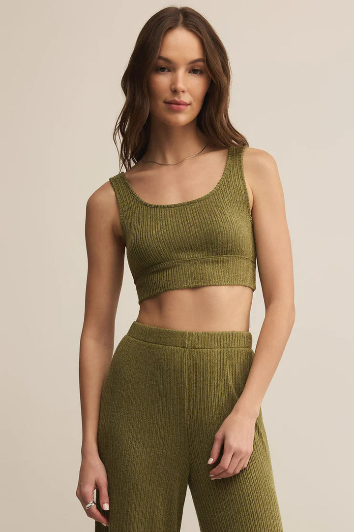 The Zoe Mini Rib Tank Bra in Fern is your new go-to for cozy, everyday support. Made from Z Supply’s ultra-soft mini rib knit, this bralette features a scoop neckline, wide straps, and a lightly supportive fit that’s perfect for lounging, layering, or sleep.