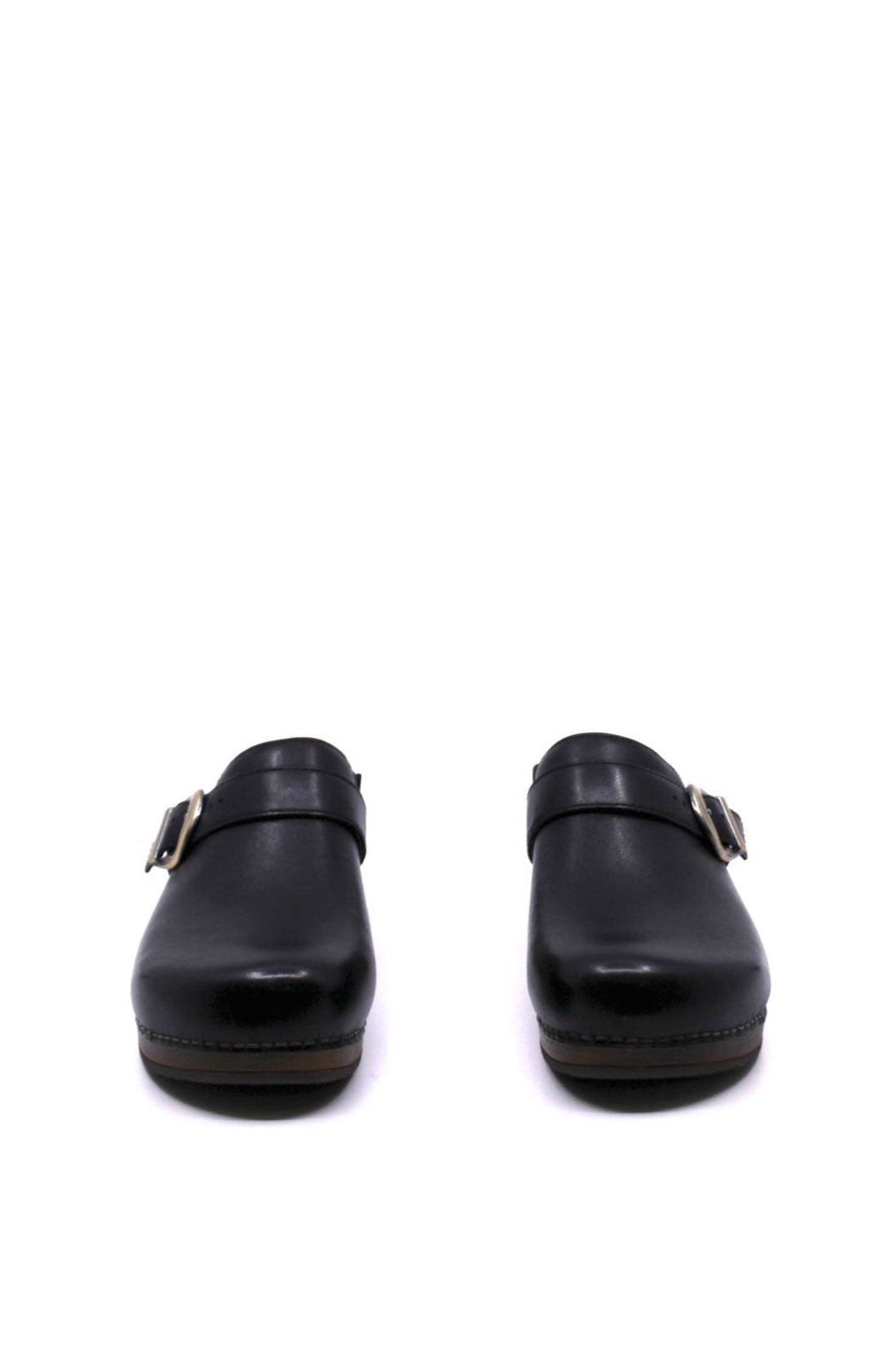 backless clog features a bold buckle and beautiful black leather from dansko