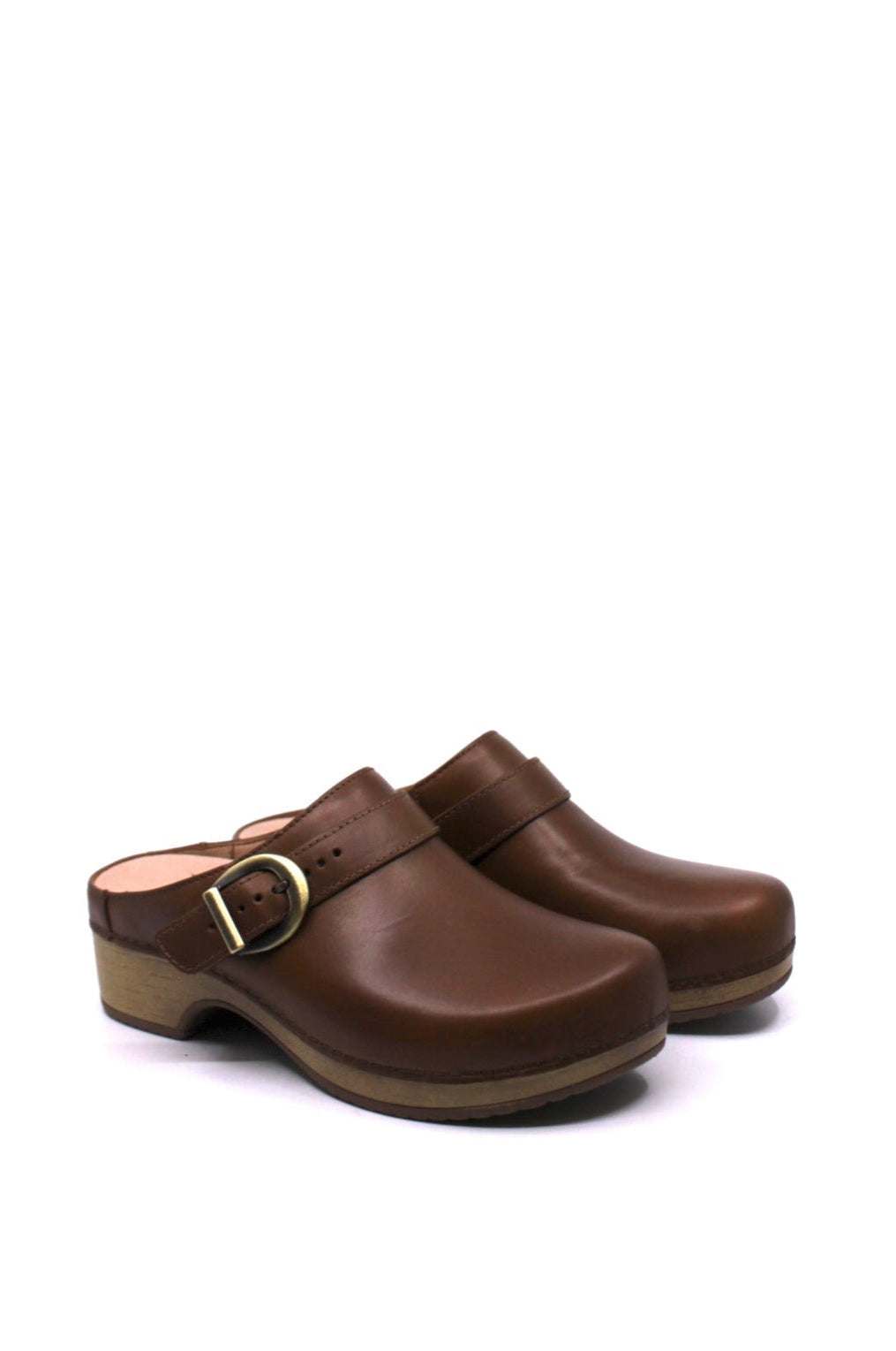 backless clog features a bold buckle and beautiful tan leather from dansko